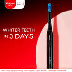 Black Colgate Optic White sonic toothbrush standing on red background with text promise 'Whiter teeth in 3 days'