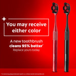 Promotional graphic showing two Colgate Optic White toothbrushes (red and black) with message "You may receive either color."