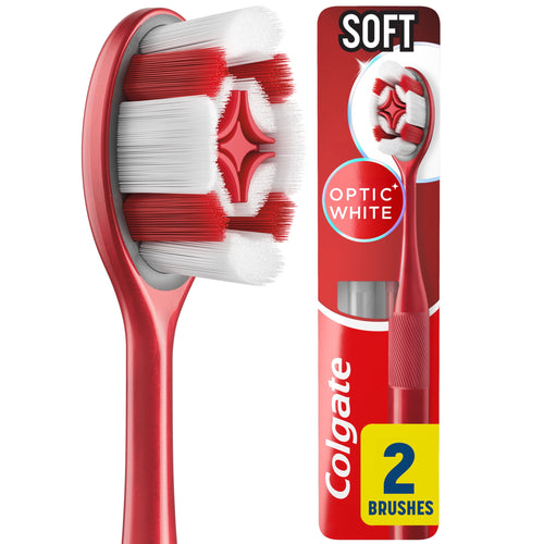 Close-up of a red Colgate Optic White toothbrush head with soft white and red bristles