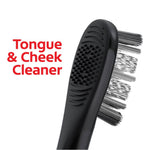 Rear view close-up of a black Colgate toothbrush head showing a textured tongue and cheek cleaner surface