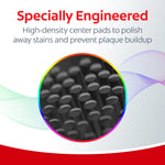 Close-up magnified view of Colgate Total toothbrush high-density center pads with caption about engineering to polish stains.