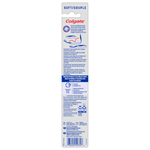 Long product information panel from the back of a Colgate travel toothbrush package with recycling icons and small text