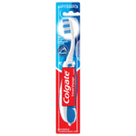 Full front view of Colgate travel toothbrush blister pack showing white handle, blue accents and soft label on header card