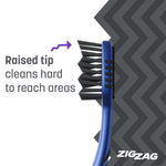 Side profile close-up of a ZigZag toothbrush head showing raised tip bristles and explanatory text about reaching hard areas