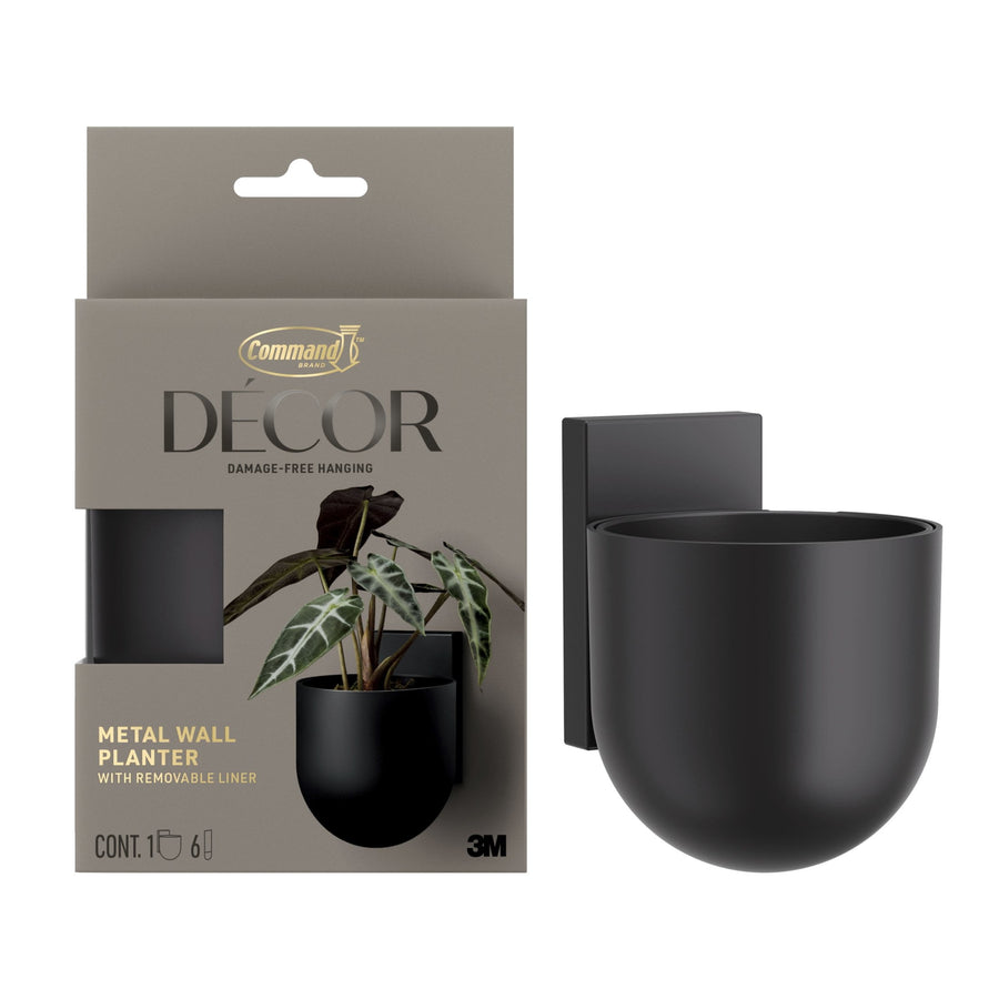 Command Décor black metal wall planter shown next to its retail packaging with removable insert visible
