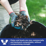 Gloved hands holding compostable food scraps over a bin with a banner noting plates and bowls are commercially and backyard compostable