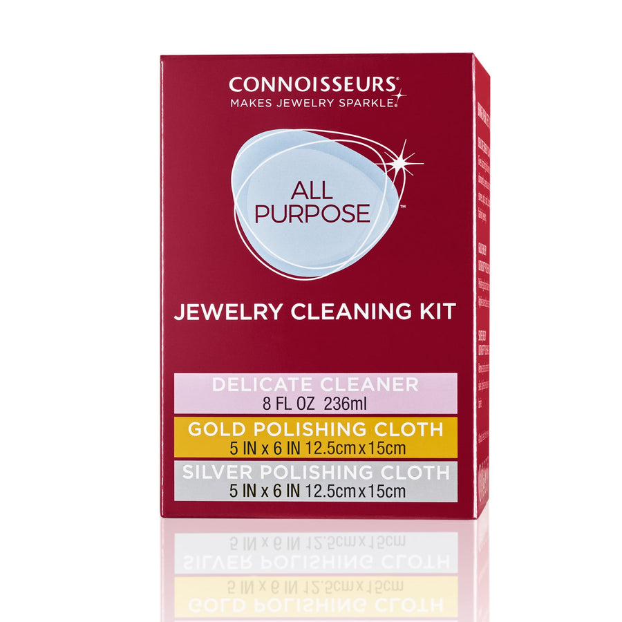 Red Connoisseurs all-purpose jewelry cleaning kit box with product name and polishing cloth callouts