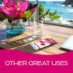 Coronado Cherry Scent Bloc package on a wooden table near a glass and flower vase with ocean view backdrop