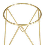 Close-up top-down view of a gold metal hairpin stand showing circular rim and welded joints