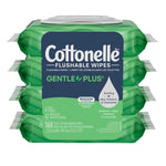 Four-pack stack of green Cottonelle GentlePlus flushable wipes showing front label and flip-top dispenser