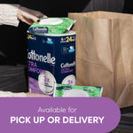 Grocery pickup scene with Cottonelle Ultra Comfort pack and flushable wipes being placed in a paper bag, with pickup text banner
