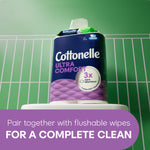 Cottonelle Ultra Comfort package on a bathroom pedestal with purple banner suggesting pairing with flushable wipes for a complete clean