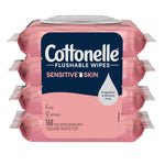 Front-facing stacked pink Cottonelle Sensitive Skin flushable wipes packs showing navy logo, droplet icon and 168 wipes callout.