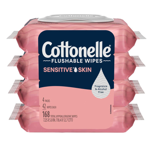 Front-facing stacked pink Cottonelle Sensitive Skin flushable wipes packs showing navy logo, droplet icon and 168 wipes callout.