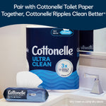 Cottonelle Ultra Clean toilet paper roll and a Cottonelle Ultra Fresh flushable wipes pack displayed on a bathroom sink