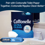 Cottonelle Ultra Clean toilet paper roll displayed behind a Cottonelle XL flushable wipes pack on a bathroom counter.