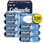 Stack of individual Cottonelle Ultra Fresh flip-top wipe packs in front of the branded outer box