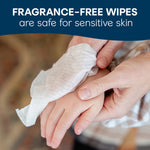 Close-up of a hand wiping a child’s hand with a Cottonelle fragrance-free flushable wipe under a banner about sensitive skin.
