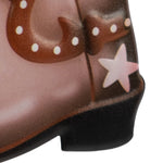 Close-up detail of printed star and stud accents on the toe and heel of a metal cowboy boot garden stake.