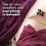 Top-down lifestyle image of purple knitted sweater and pillow with text advising use on cozy sweaters and everything in between