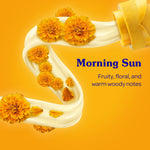 Artistic swirl of creamy fabric softener with marigold-like flowers and text ‘Morning Sun’ describing scent notes