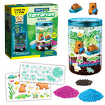 Creativity for Kids terrarium kit box and assembled jar with capybara figurines, stickers, colored sand and potting mix.