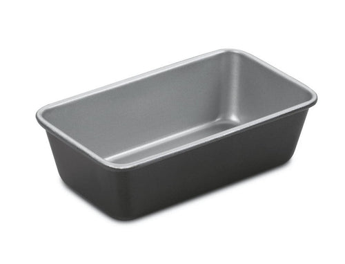 Gray nonstick metal loaf pan with rounded corners and tapered sides on white