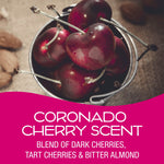 Close-up photo of ripe dark cherries in a small metal bucket with promotional pink banner reading Coronado Cherry Scent