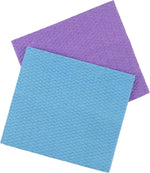 Two textured square cellulose sponge cloths laid flat, one blue and one purple, on white background