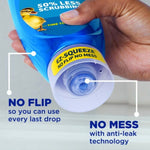 Hand holding an upside-down Dawn bottle close-up showing EZ-SQUEEZE cap and callouts 'No flip' and 'No mess'