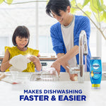 Smiling adult and child washing dishes at a bright kitchen sink with a Dawn bottle visible at the side