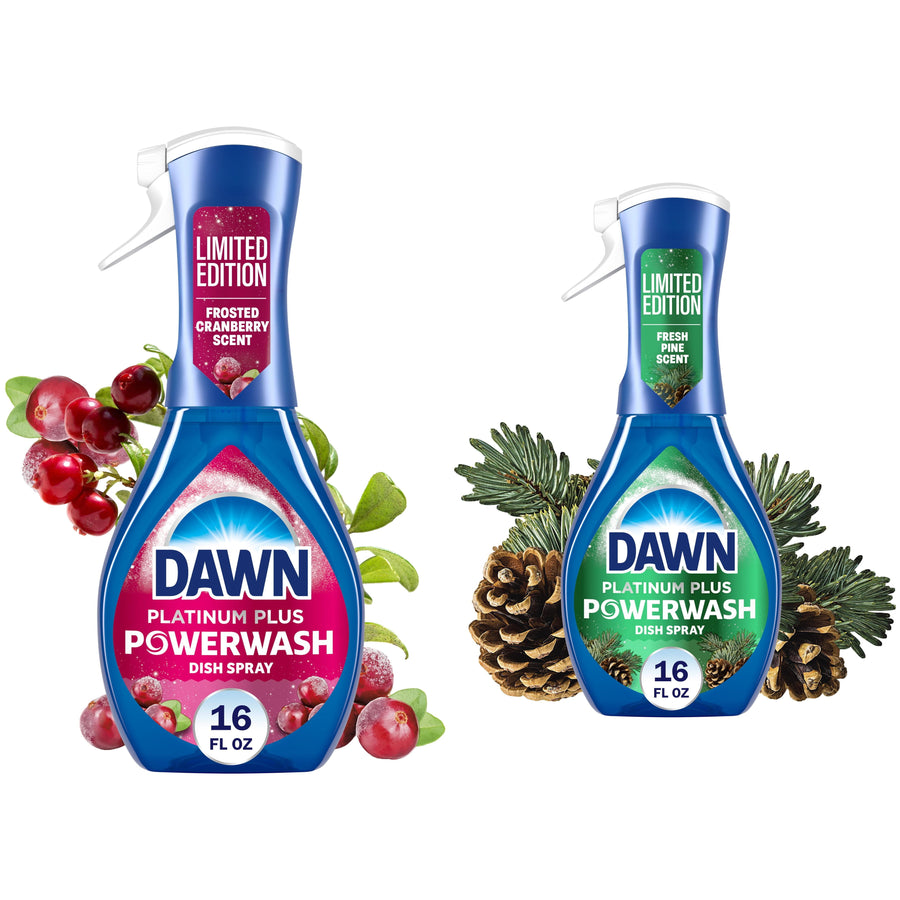 Two Dawn Platinum Plus Powerwash dish spray bottles, limited-edition Frosted Cranberry and Fresh Pine, with fruit and pine accents