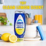 Dawn Platinum bottle staged on a kitchen counter with lemon halves and sponges, text inviting to try clean lemon scent