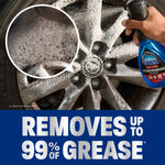 Spray foam being applied to a car wheel rim with inset close-up of suds and a Dawn Powerwash bottle visible