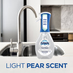 Dawn Platinum Powerwash spray bottle placed on a kitchen sink counter with text reading light pear scent beneath