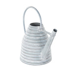 Angled rear view of a gray beehive-style metal watering can with loop handle and tilted spout