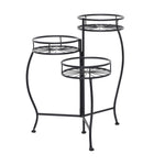 Black metal three-tier plant stand photographed on white background showing curved legs and circular shelves.