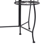 Close-up of lower section and leg joint of black metal plant stand showing hinge and supporting crossbars.