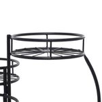 Close-up of upper circular starburst wire shelf on black metal plant stand showing rim and radial spokes.
