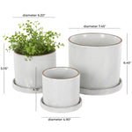 Three DecMode white ceramic planters with grid texture and brown rims shown with dimension callouts and one planted with greenery