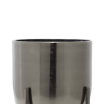 Top-front close-up of a DecMode metal planter rim and upper body showing metallic finish on white background