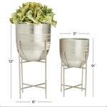 Pair of brushed dome silver metal planters with stands shown with dimensional measurement callouts