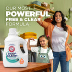 Lifestyle scene with ARM & HAMMER Deep Clean detergent bottle in foreground and smiling woman and child flexing arms in laundry room
