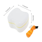 White denture storage case with yellow trim and orange dual-head denture brush, product dimensions overlaid