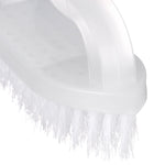 Detail close-up of the translucent curved handle and bristle edge of a white plastic scrub brush