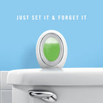 Febreze air freshener device placed on a toilet tank with slogan ‘Just set it & forget it’ on blue background
