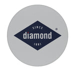 Top view of a round Diamond logo lid from a Diamond L'Elegance toothpick tube