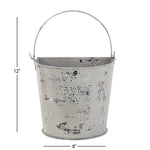 Distressed metal bucket planter with handle shown with simple height and width measurement lines