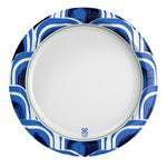 Top-down view of a white paper plate with a blue wave patterned rim and small Dixie Ultra logo at center bottom