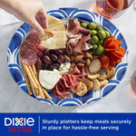 Dixie Ultra oval platter with charcuterie-style food arranged on it and a hand reaching to grab a cracker.
